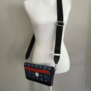 Authentic MCM wallet with cross body strap and belt strap